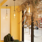 vadim-modern-glass-globe-pendant-light-with-gold-steel-rod-and-perforated-cage