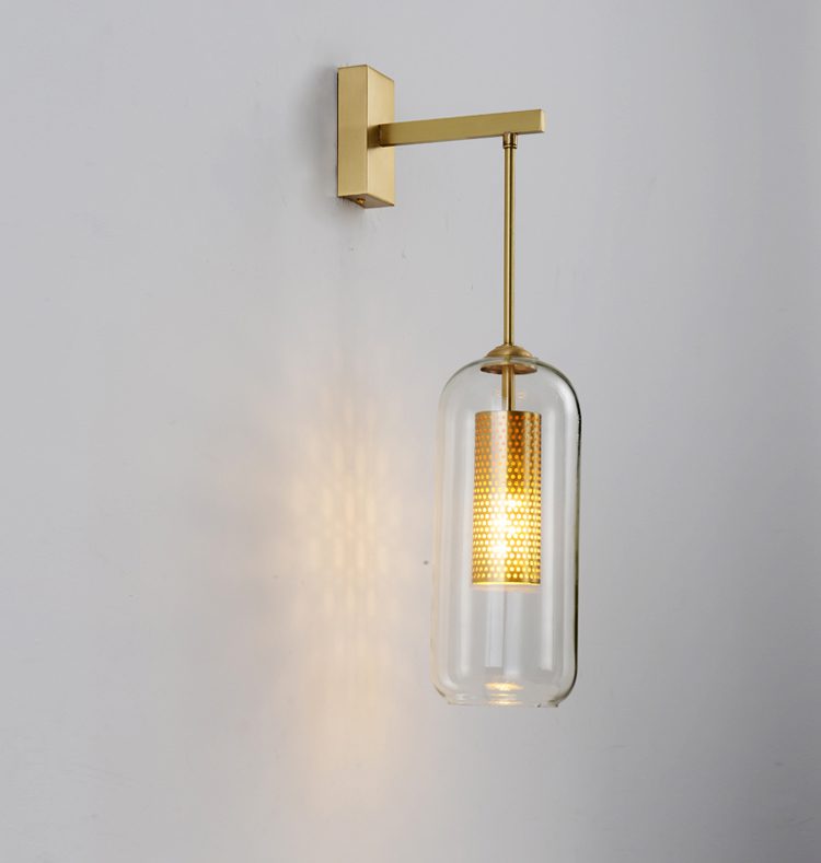 modern-vadim-glass-wall-sconce-with-perforated-metal-cage-and-brass-finish-for-luxury-interiors