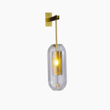 modern-vadim-glass-wall-sconce-with-perforated-metal-cage-and-brass-finish-for-luxury-interiors