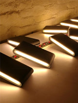 modern-oval-led-wall-sconce-minimalist-aluminum-wall-wash-light-for-contemporary-interiors