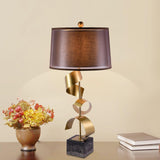 Modern Sculptural Spiral Metal Table Lamp with Gold Leaf Finish and Black Marble Base for Living Room