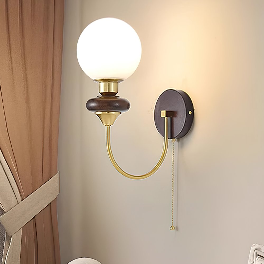 mid-century-walnut-wood-wall-sconce-lighting-with-white-glass-shade-and-pull-cord-switch