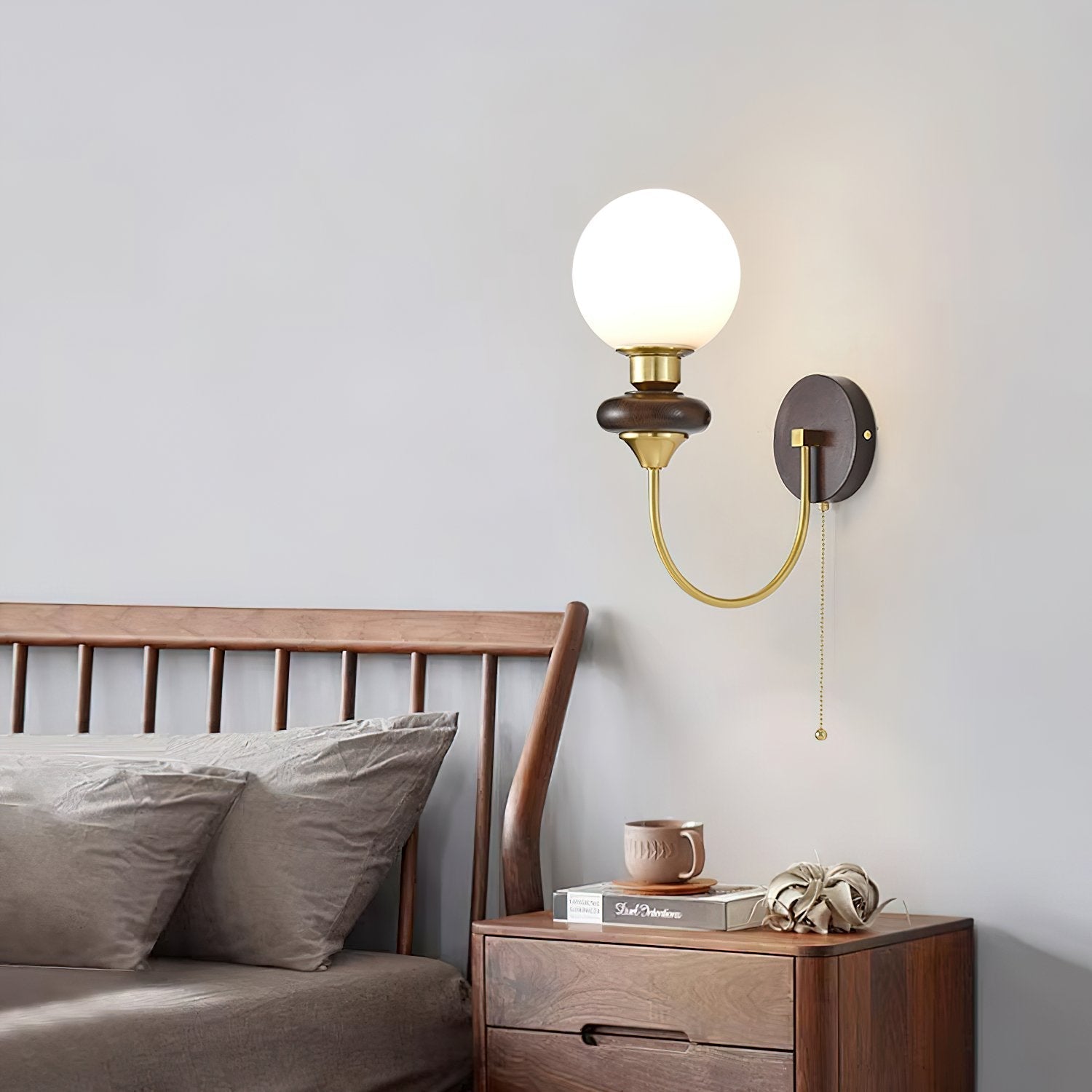 mid-century-walnut-wood-wall-sconce-lighting-with-white-glass-shade-and-pull-cord-switch