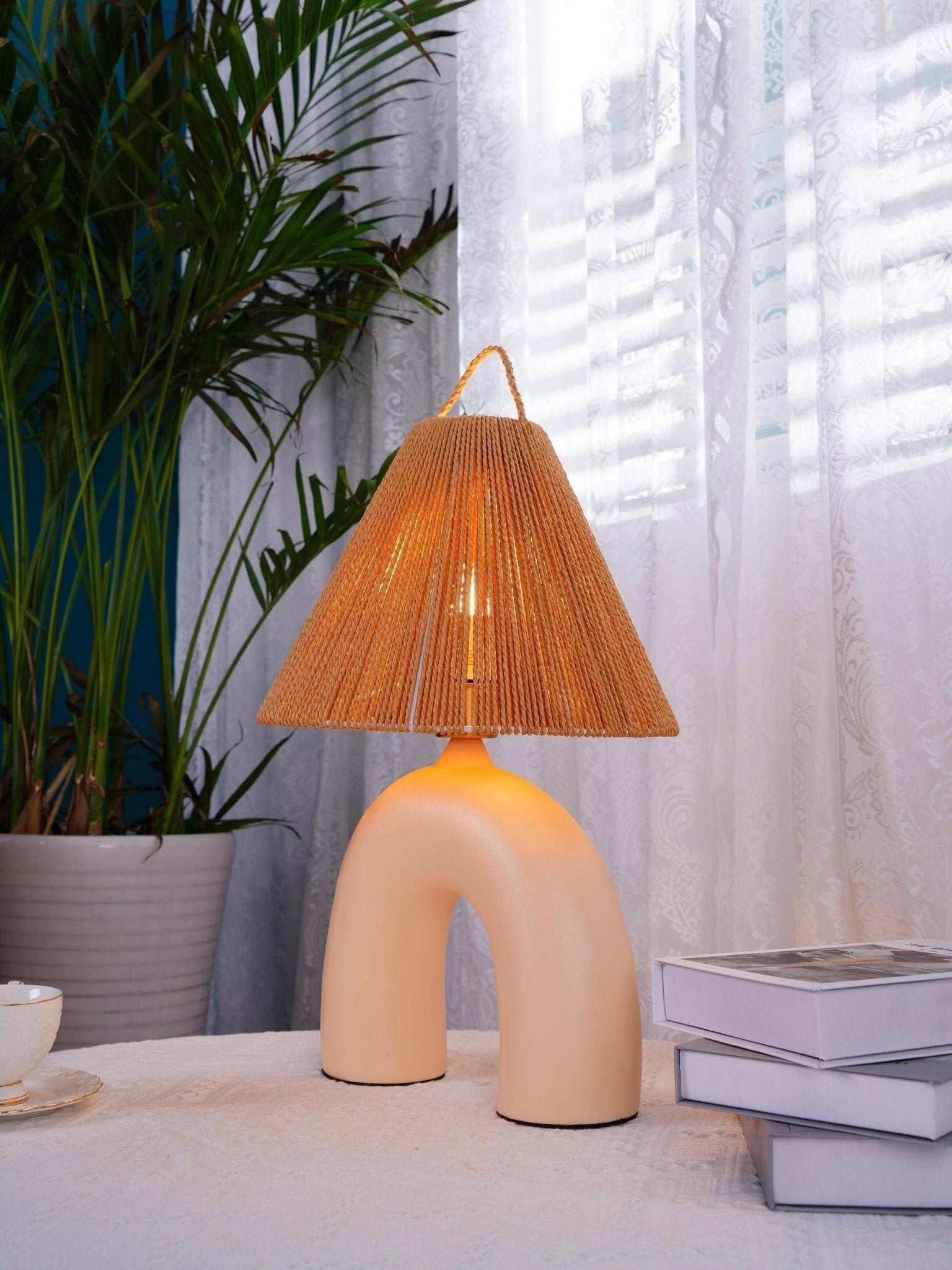 Sculptural Arched Ceramic Table Lamp with Braided Rope Shade and Handcrafted Base