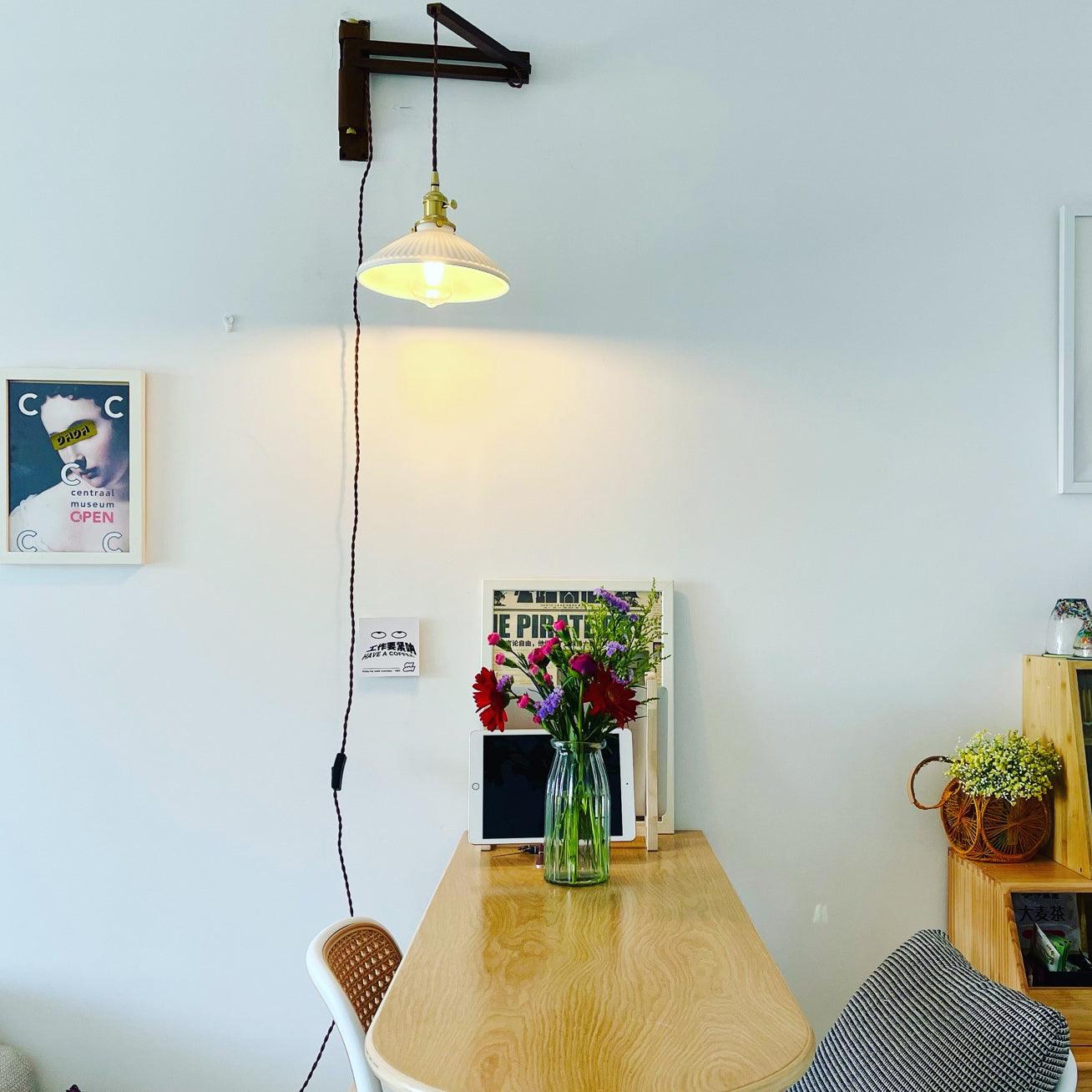 modern-walnut-wood-retractable-wall-sconce-with-pleated-ceramic-shade-and-adjustable-arm
