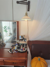 modern-walnut-wood-retractable-wall-sconce-with-pleated-ceramic-shade-and-adjustable-arm