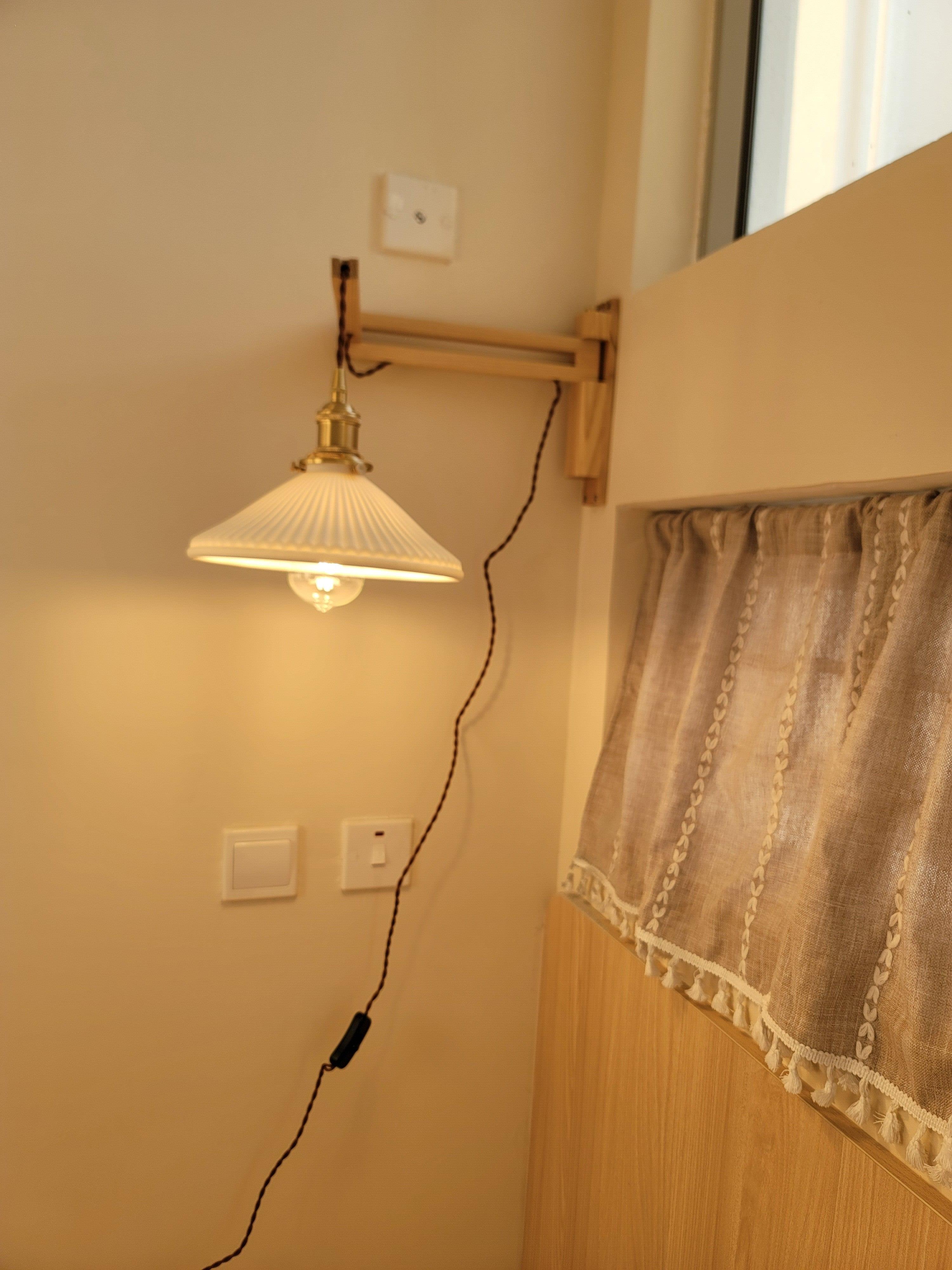 modern-walnut-wood-retractable-wall-sconce-with-pleated-ceramic-shade-and-adjustable-arm