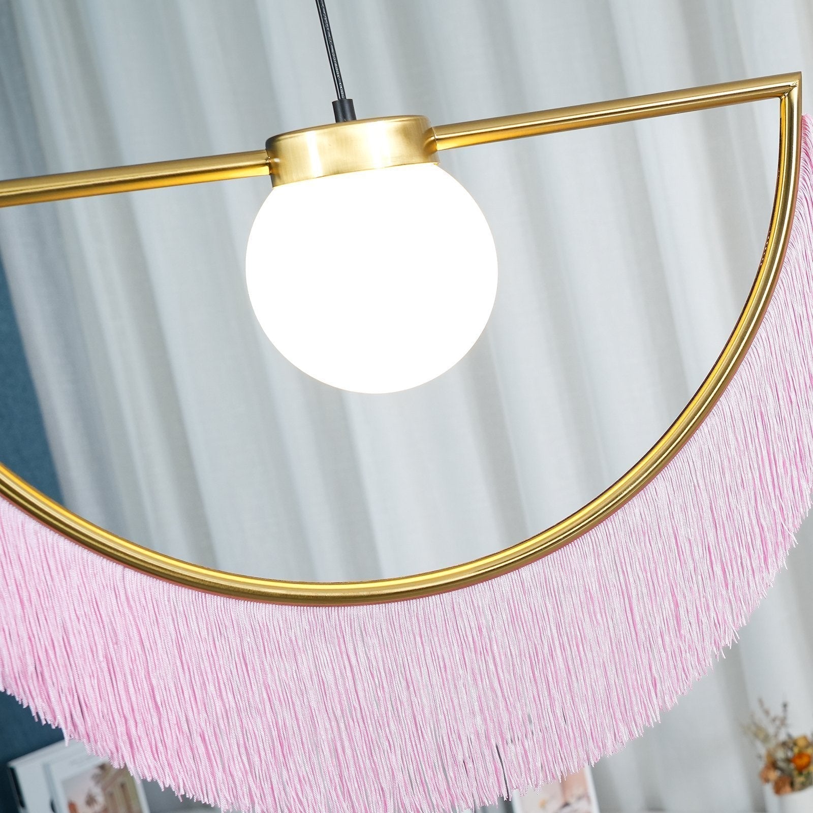 modern-bohemian-tassel-fringe-pendant-light-with-glass-globe-and-gold-metal-frame