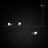 modern-minimalist-branch-chandelier-with-brass-bird-figures-and-white-glass-spheres