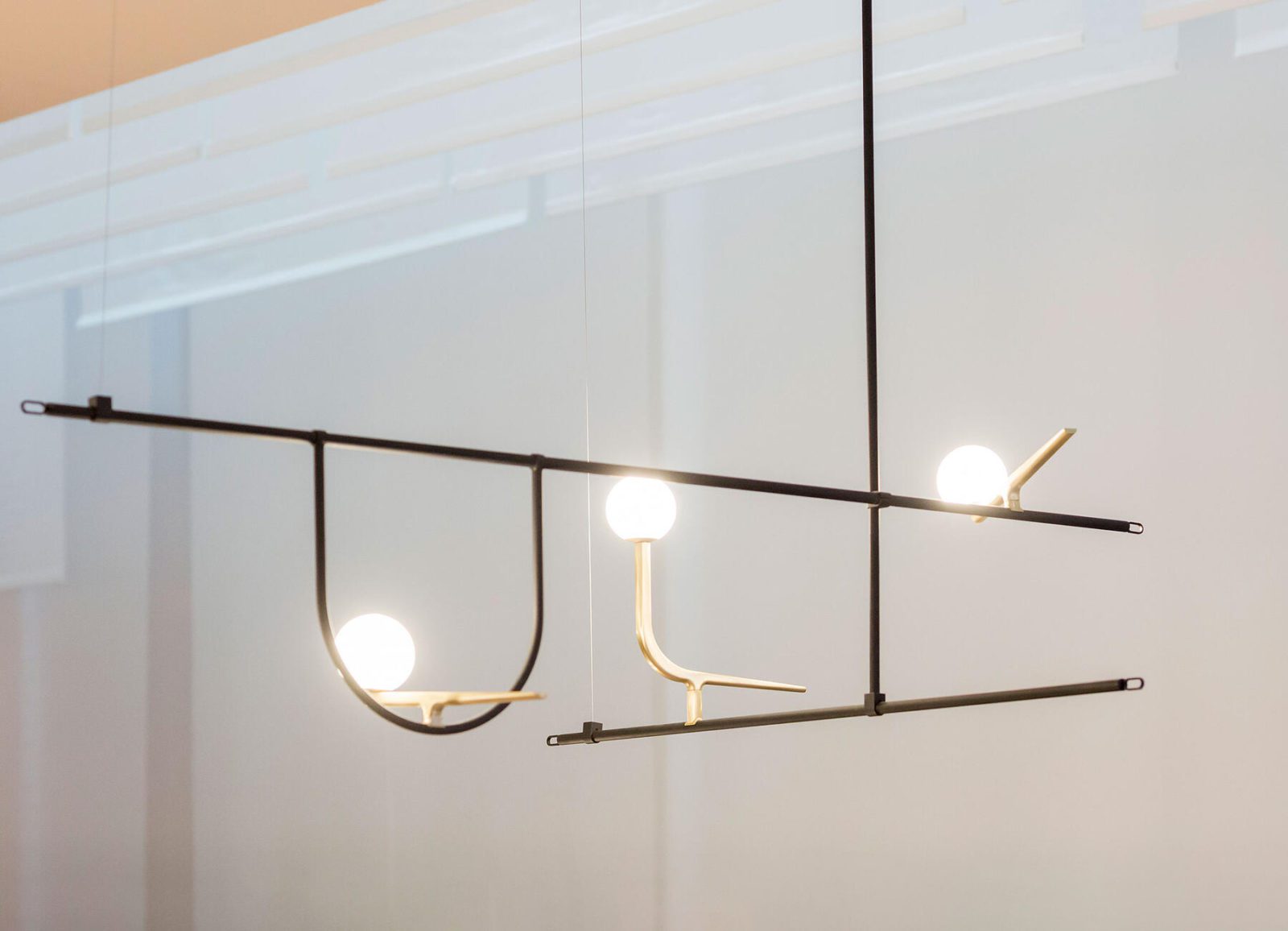 modern-minimalist-branch-chandelier-with-brass-bird-figures-and-white-glass-spheres