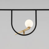 modern-minimalist-branch-chandelier-with-brass-bird-figures-and-white-glass-spheres
