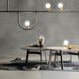 modern-minimalist-branch-chandelier-with-brass-bird-figures-and-white-glass-spheres