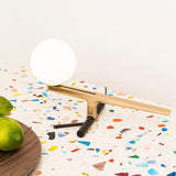 modern-yanzi-style-led-table-lamp-with-white-glass-globe-and-gold-metal-finish