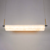 modern-linear-alabaster-led-pendant-light-with-brass-architectural-accents-for-home-dining