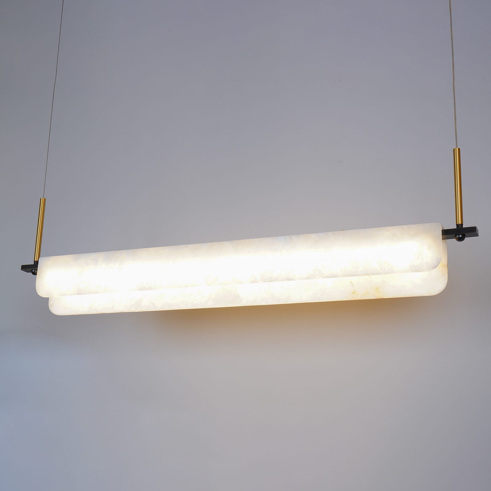 modern-linear-alabaster-led-pendant-light-with-brass-architectural-accents-for-home-dining