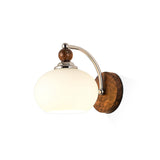 modern-walnut-wood-wall-sconce-with-globe-glass-shade-mid-century-interior-vanity-lighting