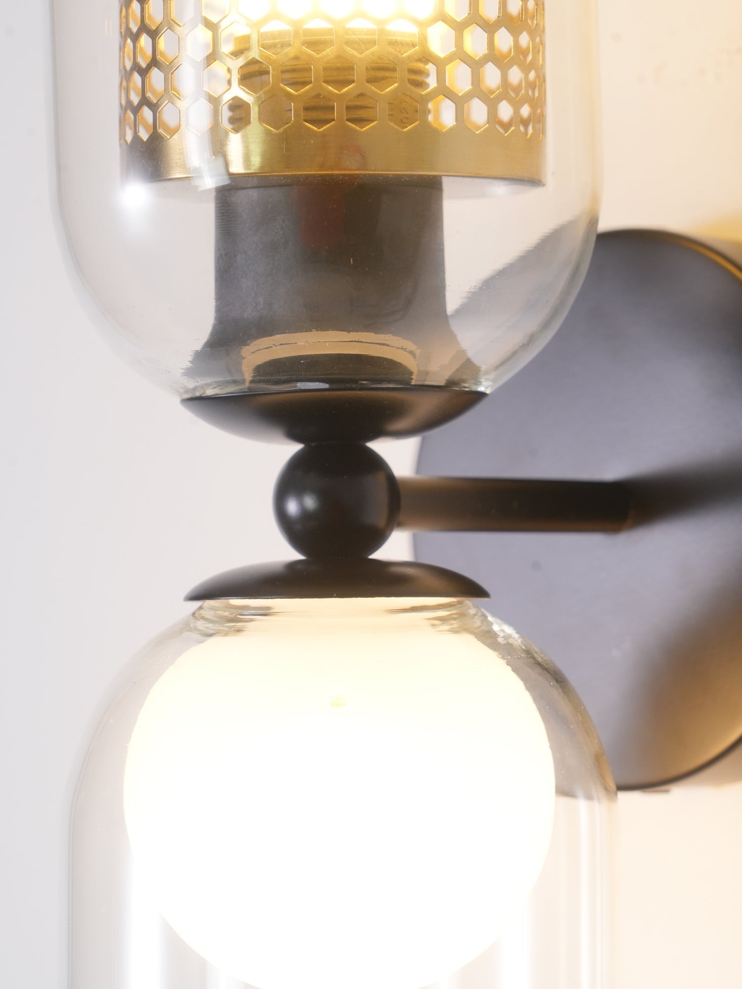 modern-industrial-black-metal-and-clear-glass-multidirectional-double-wall-sconce