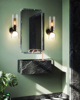 modern-industrial-black-metal-and-clear-glass-multidirectional-double-wall-sconce