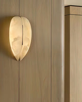 modern-symmetrical-curved-alabaster-led-wall-light-zelda-sconce-for-living-areas