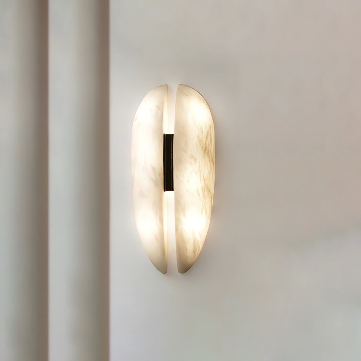 modern-symmetrical-curved-alabaster-led-wall-light-zelda-sconce-for-living-areas