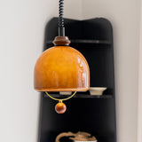 Amber Glass Dome Pendant Light with Walnut Wood Detail and Retractable Elastic Cord