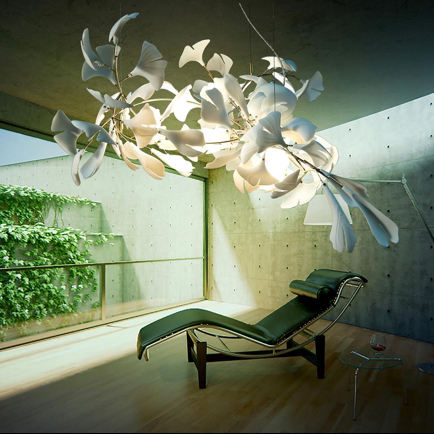 artistic-gingko-branch-chandelier-with-handcrafted-white-ceramic-leaves-and-gold-finish