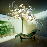 artistic-gingko-branch-chandelier-with-handcrafted-white-ceramic-leaves-and-gold-finish