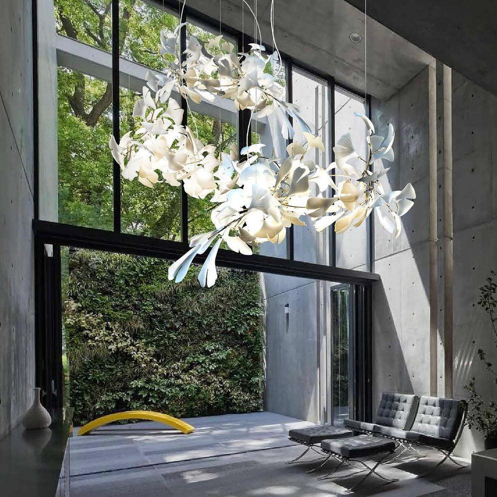 artistic-gingko-branch-chandelier-with-handcrafted-white-ceramic-leaves-and-gold-finish