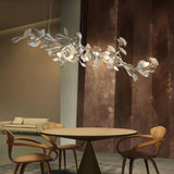 artistic-gingko-branch-chandelier-with-handcrafted-white-ceramic-leaves-and-gold-finish