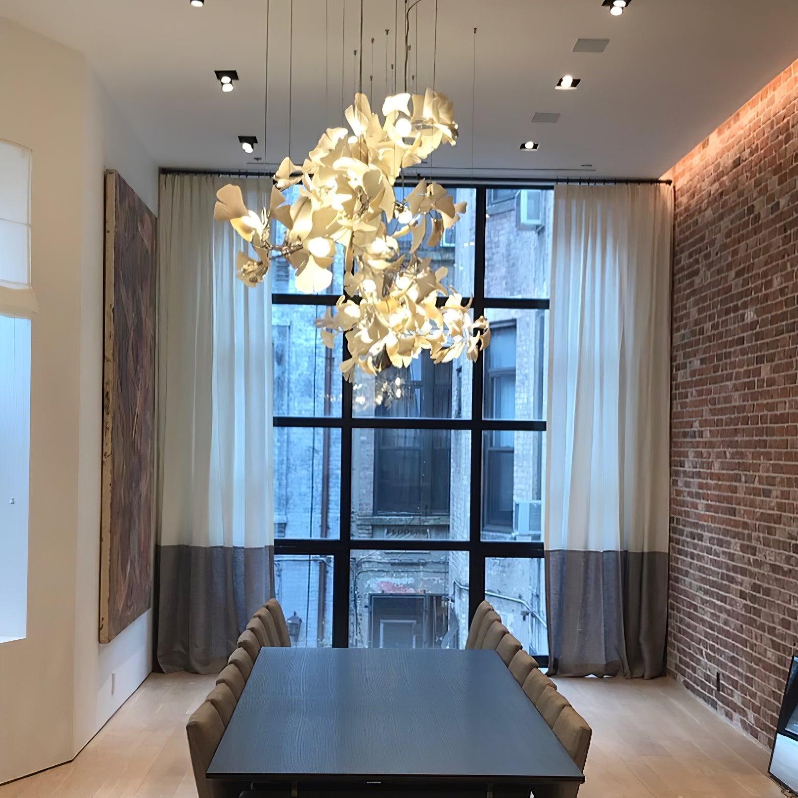 artistic-gingko-branch-chandelier-with-handcrafted-white-ceramic-leaves-and-gold-finish