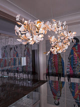 artistic-gingko-branch-chandelier-with-handcrafted-white-ceramic-leaves-and-gold-finish