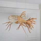 artistic-koi-fish-wood-slat-chandelier-large-scale-statement-lighting-for-home