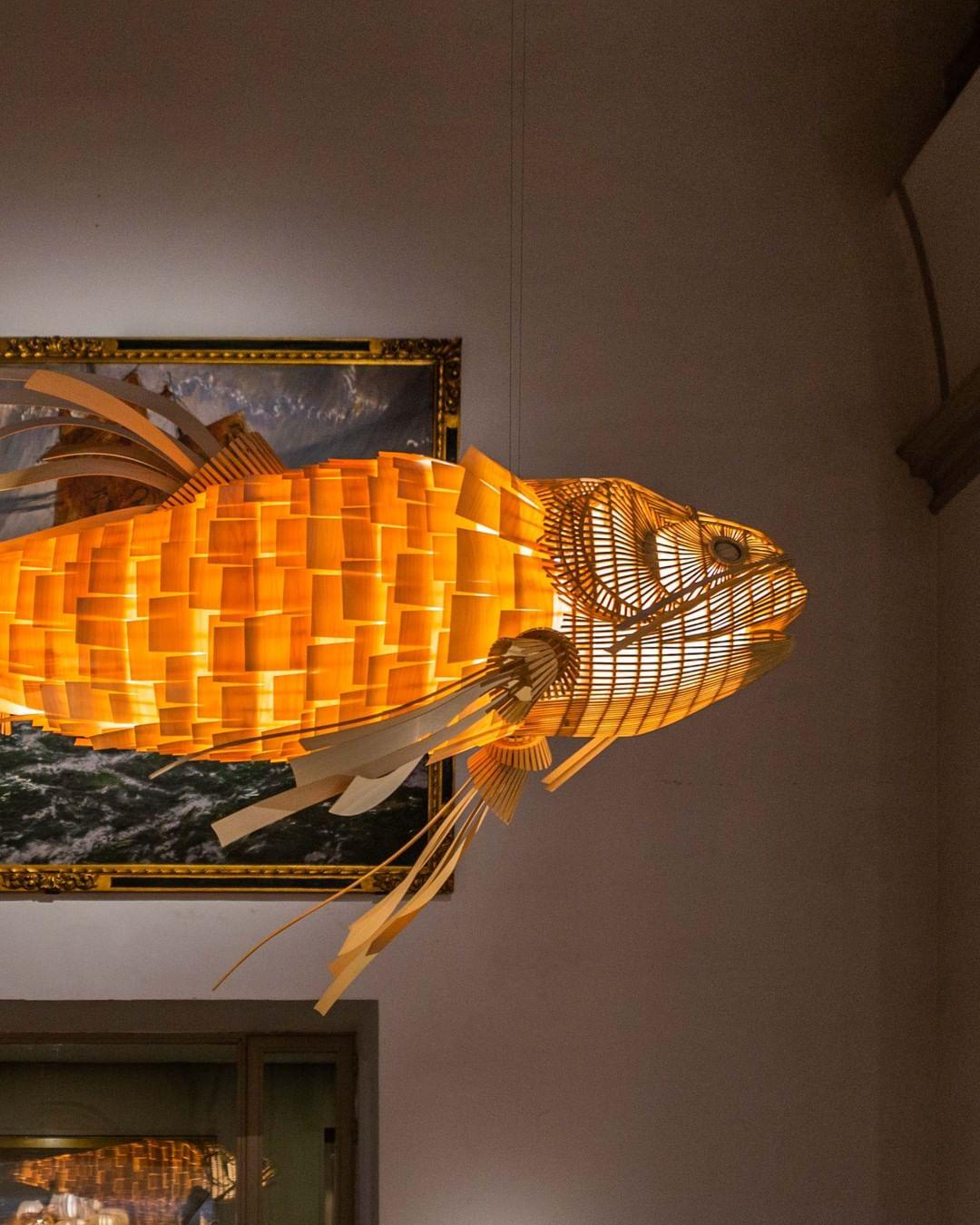 artistic-koi-fish-wood-slat-chandelier-large-scale-statement-lighting-for-home