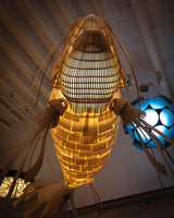 artistic-koi-fish-wood-slat-chandelier-large-scale-statement-lighting-for-home