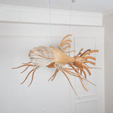 artistic-koi-fish-wood-slat-chandelier-large-scale-statement-lighting-for-home