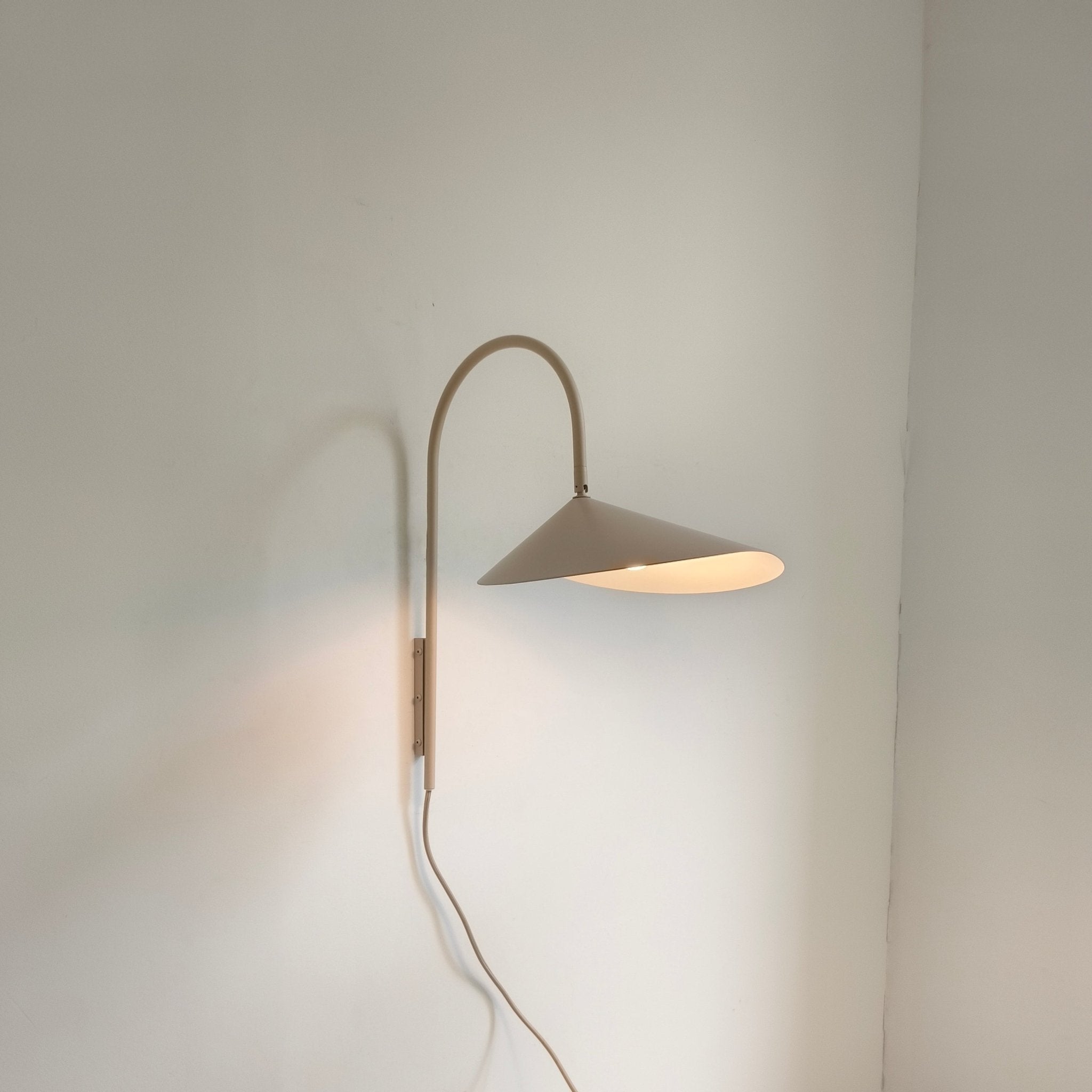 Arum Swivel Bracket Wall Lamp with Adjustable Curved Shade for Modern Interiors
