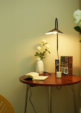 Arum Swivel Bracket Wall Lamp with Adjustable Curved Shade for Modern Interiors