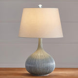 blue-sculptural-ceramic-table-lamp-with-white-fabric-shade-for-contemporary-living-room-decor