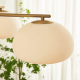 Briette Mid Century Geometric Cross Frame Chandelier with Spherical Glass Globes