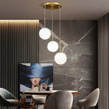 Contemporary Gold Globe Pendant Lighting with White Frosted Glass Shades for Kitchen