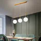 Contemporary Gold Globe Pendant Lighting with White Frosted Glass Shades for Kitchen