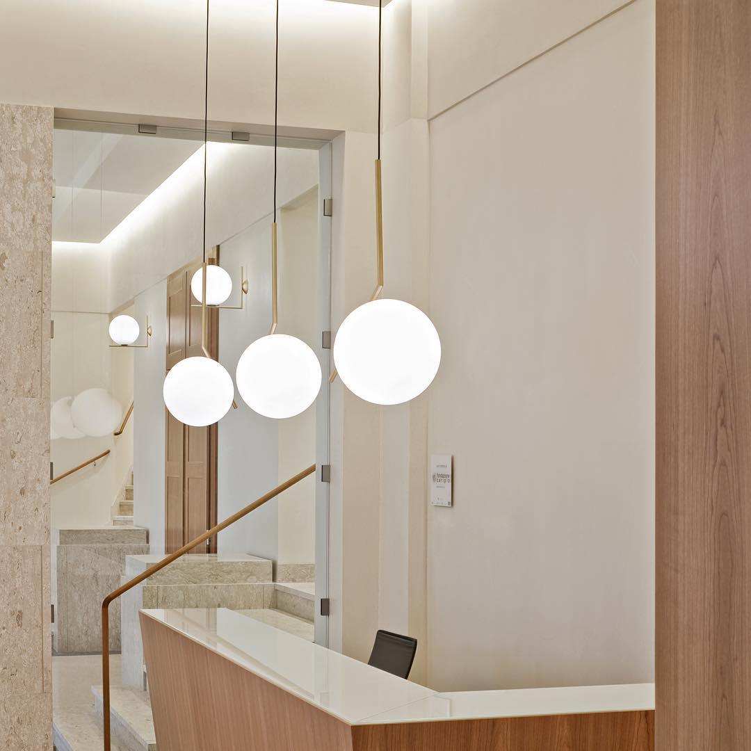 Contemporary Minimalist Equilibrium Glass Globe Pendant Light with Brass and Black Finishes