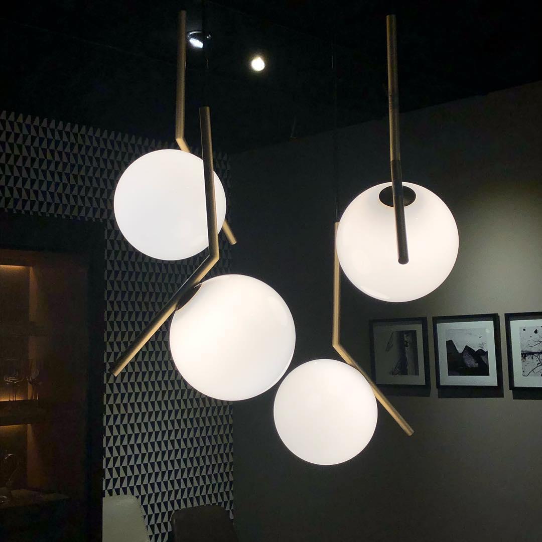 Contemporary Minimalist Equilibrium Glass Globe Pendant Light with Brass and Black Finishes