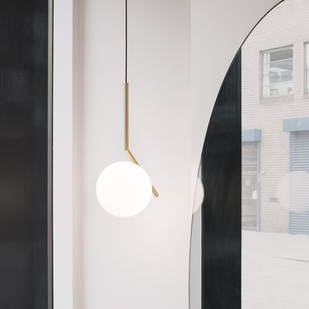 Contemporary Minimalist Equilibrium Glass Globe Pendant Light with Brass and Black Finishes