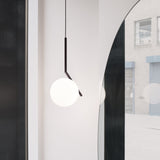 Contemporary Minimalist Equilibrium Glass Globe Pendant Light with Brass and Black Finishes