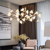 Elegant Brass Branch Ceiling Chandelier with White Ceramic Flowers for Luxury Interior Lighting