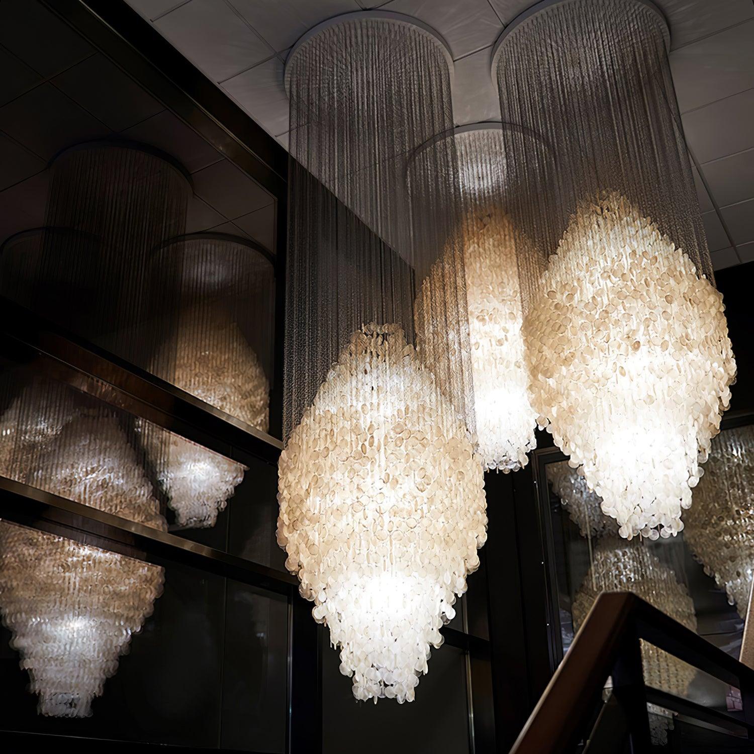 Elegant Coastal Shell Waterfall Chandelier with Cascading White Shell Discs for High Ceiling Spaces