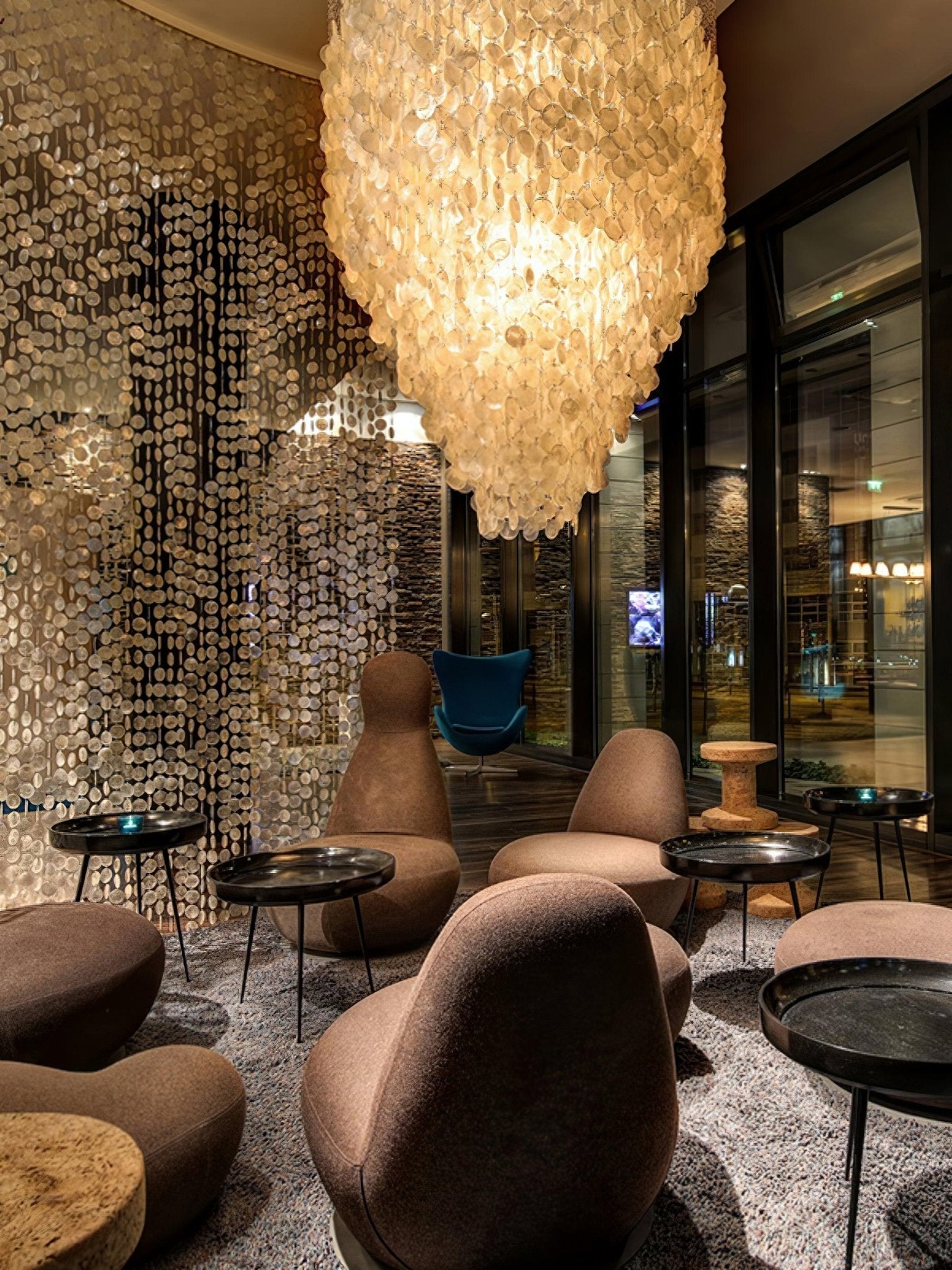 Elegant Coastal Shell Waterfall Chandelier with Cascading White Shell Discs for High Ceiling Spaces