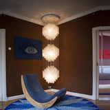 Elegant Coastal Shell Waterfall Chandelier with Cascading White Shell Discs for High Ceiling Spaces