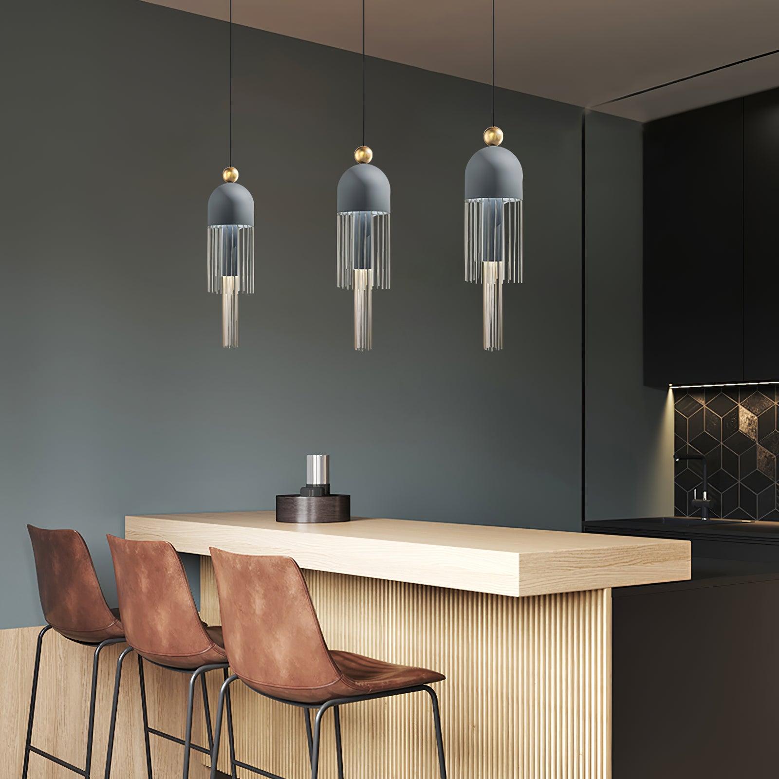 Elegant Metal Tassel Pendant Light with Integrated LED and Clear Glass Shade for Modern Interiors